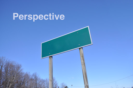 Image of a blank road sign, with the juxtaposition of the word "Perspective" in the top left side