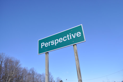 The same image. Now the word "Perspective" appears juxtaposed in the sign, following the picture's perspective