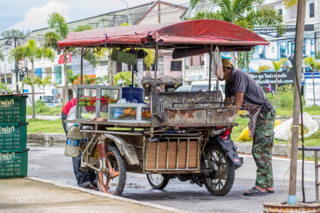 Photo - Travelling merchant in Asia