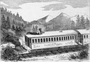 John laying down on top of a moving train car