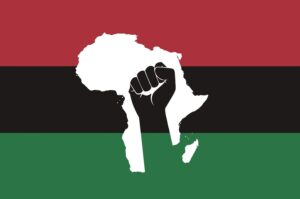 An image of the Pan-African flag with three horizontal stripes: red (top), black (middle), and green (bottom). Centered on the flag is a white silhouette of the African continent. Inside the continent shape, a black raised fist is depicted, symbolizing Black power, resistance, and solidarity.