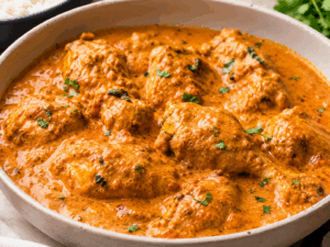 Kuku wa kupaka (often shortened to Kuku paka) is a chicken dish and staple of the Swahili people, particularly in the coastal regions of Kenya and Tanzania. The name translates roughly to "chicken in coconut sauce". The recipe is a blend of African, Arabic, and Indian influences.  Click the image to open a video on youtube.com to lean how to make this dish.