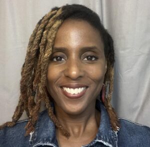 This is an image of Kafi Ealey, an assistant professor in Nutrition at Toronto Metropolitan University. Her individuality and teaching style reflects both professionalism and personality.
