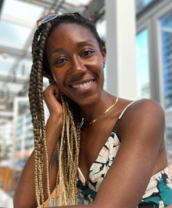 This is an image of Mikahelia Wellington, a strong woman, educator, advocate, and Registered Dietitian.