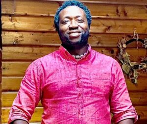 This is an image of Toyin Kayo-Ajayi, a farmer and founder of the Canadian Black Farmers Association.