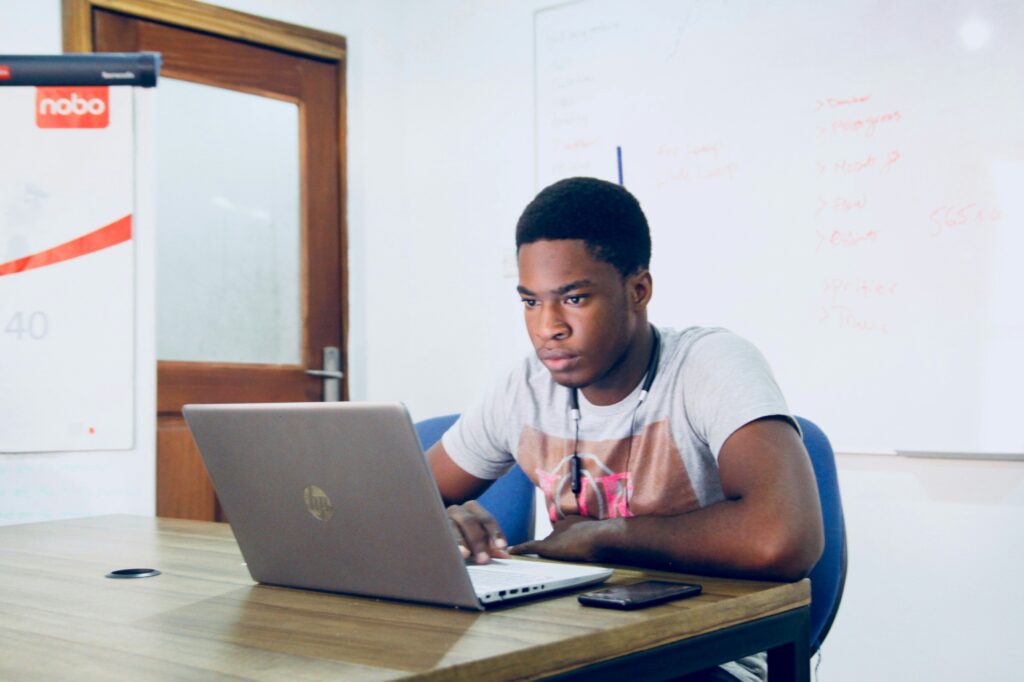 Student looking at laptop